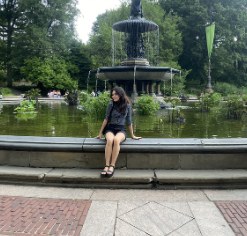 Sitting by a fountain in New York